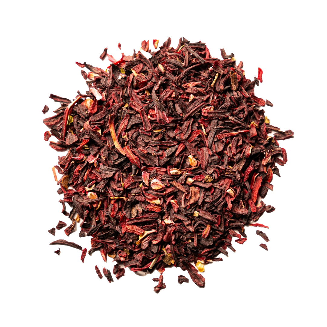 A close up view of a small pile of organic, coarse cut hibiscus.