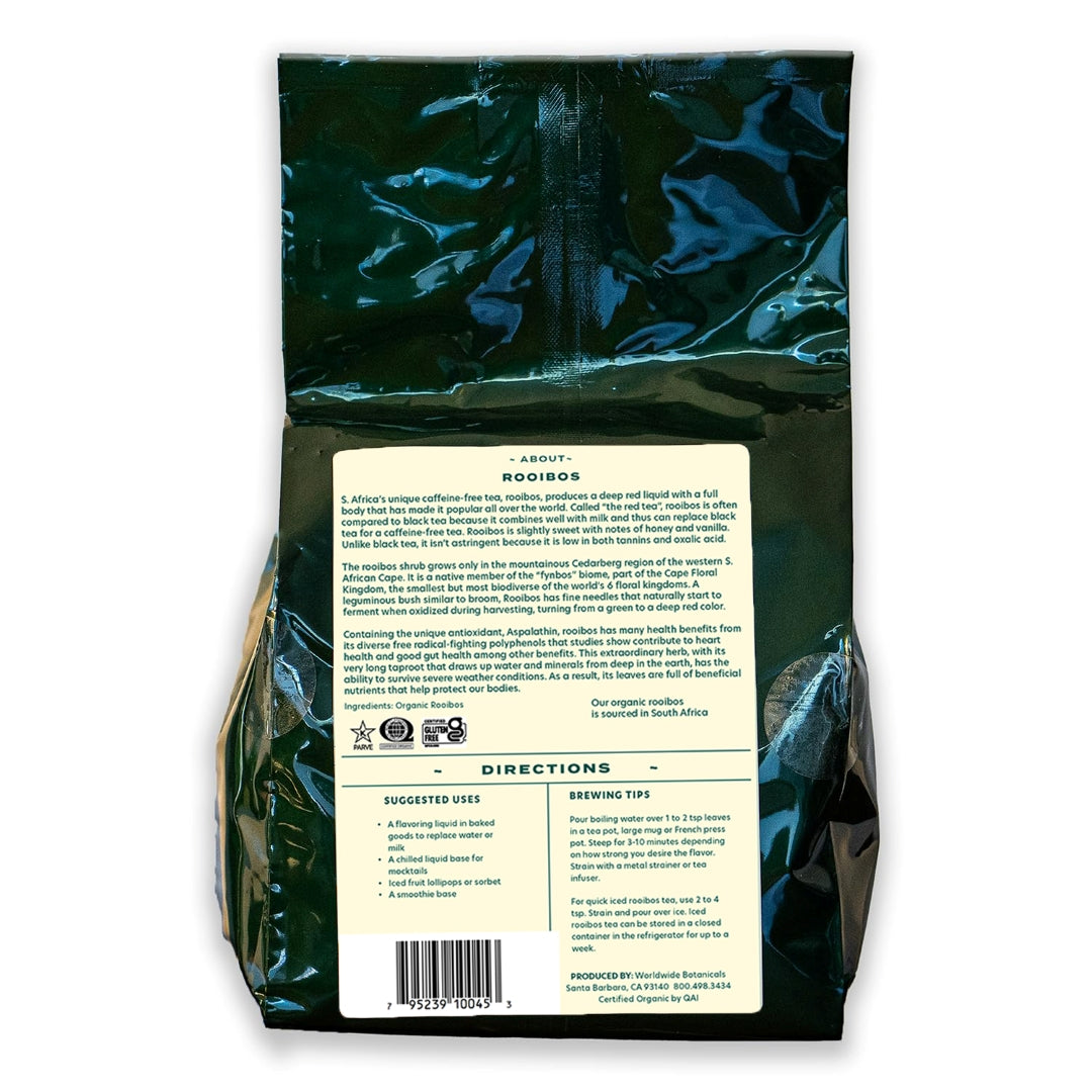 Dark green bag with light yellow-ish back label filled with organic loose leaf rooibos.